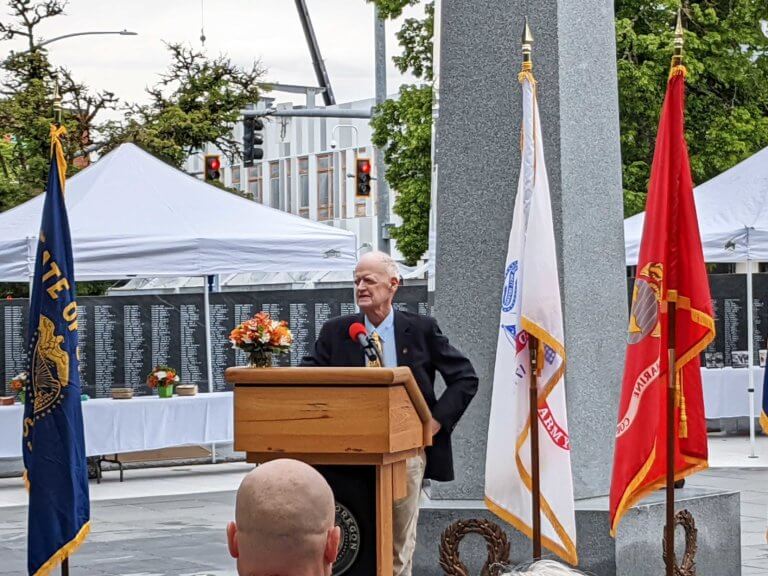 Oregon Senator Peter Courtney speaks from the podium